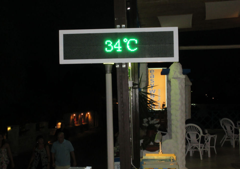 34 degrees at night - displayed outside Pefkos by Night bar